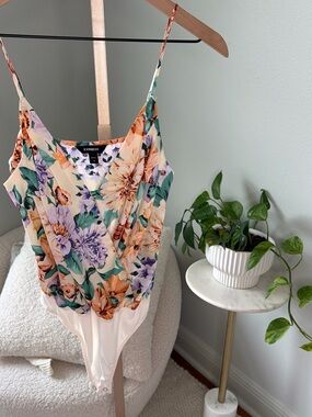 Express Floral V-Neck Cami Bodysuit in Cream with Green, Orange & Purple Flowers